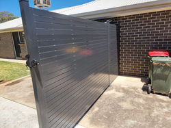 1.8m high aluminium Slat panel fence located in burton. And a 1.2m high screen