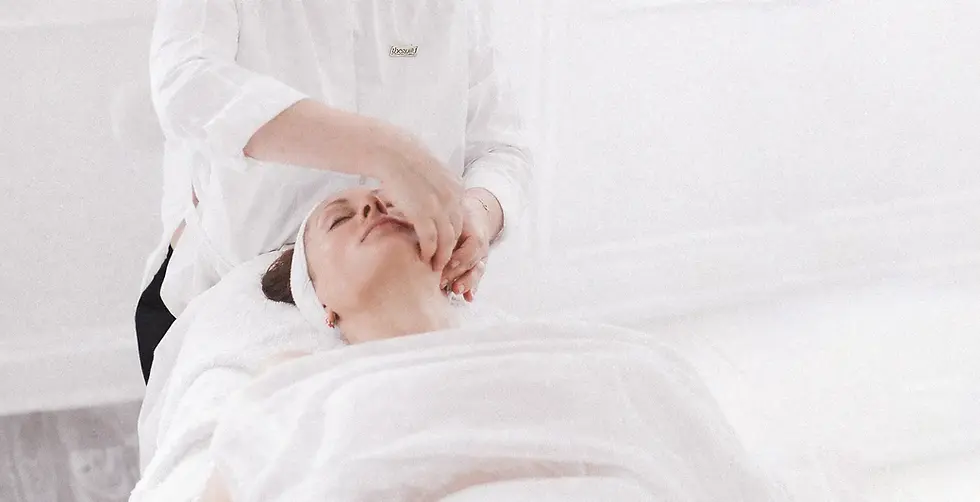 A woman in her 40s having a luxury facial treatment