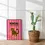 Thumbnail: Bengal cat art print with pink and orange stripes beside a cactus in a wicker pot. Funny rude cat wall art by The Nice Cats C