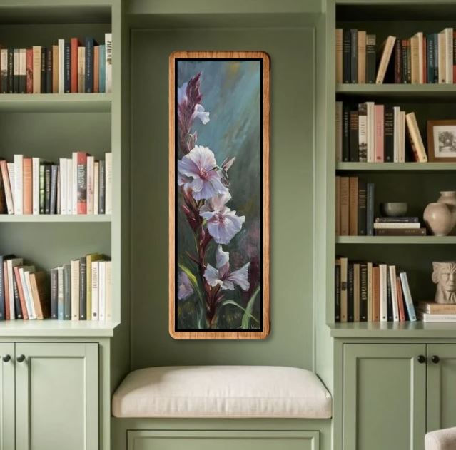 Hummingbird feeding off of a gladiolus flower