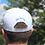 Thumbnail: Play Local Give local hat