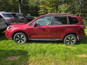 Red Subaru SUV