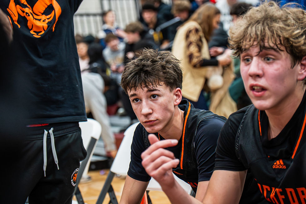 Rockford guard Eli Wolfie at a timeout at the dzone showcase