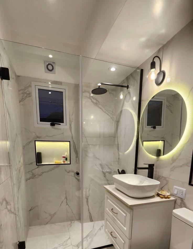 Waterproof luxury marble PVC wall panels installed in a Columbus, Ohio bathroom