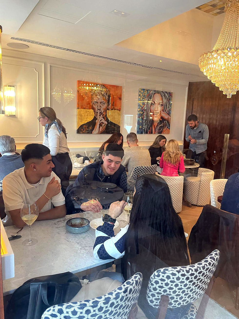 Granduke Madrid Restaurant and Art Gallery  interior with Vincent Vee Paintings and gusests