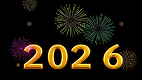 Golden "2026" with colorful fireworks in the background against a black sky, creating a festive and celebratory mood.