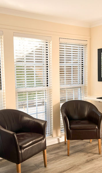 Hotel room seating area with chairs and window at Kilconquhar Castle Estate