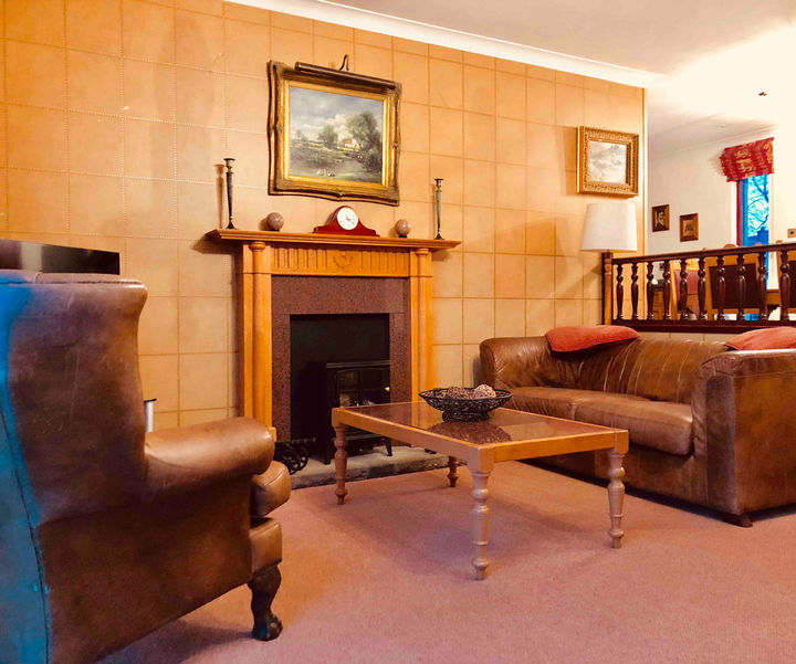 Spacious lounge in a superior 3 bedroom villa with sauna, ideal for families or groups staying near St Andrews.