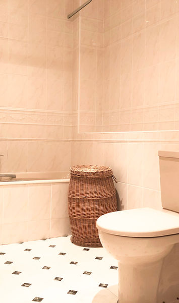 Bathroom with bath and basin in 2 bedroom apartment at Kilconquhar Castle Estate