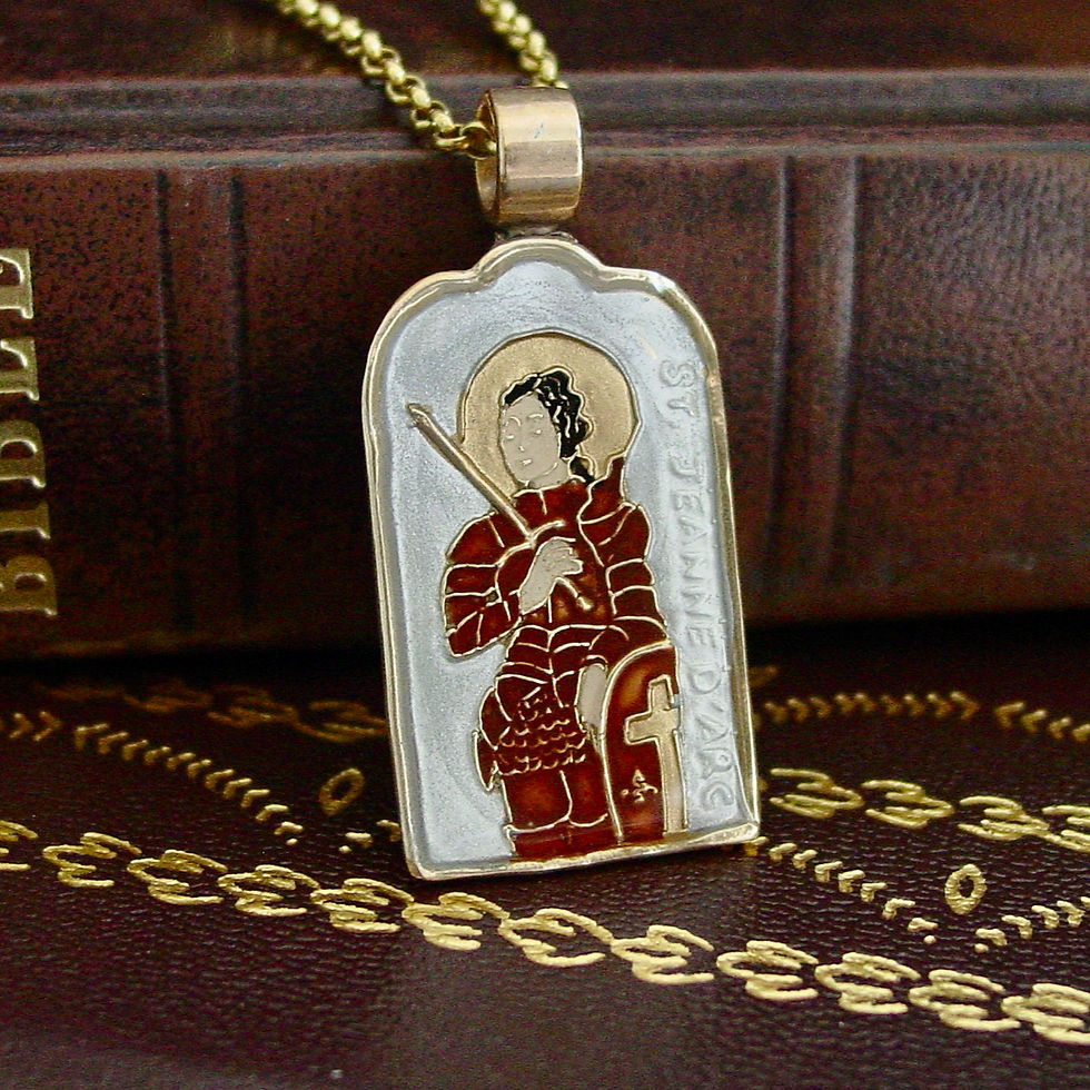 Joan of Arc necklace on bible