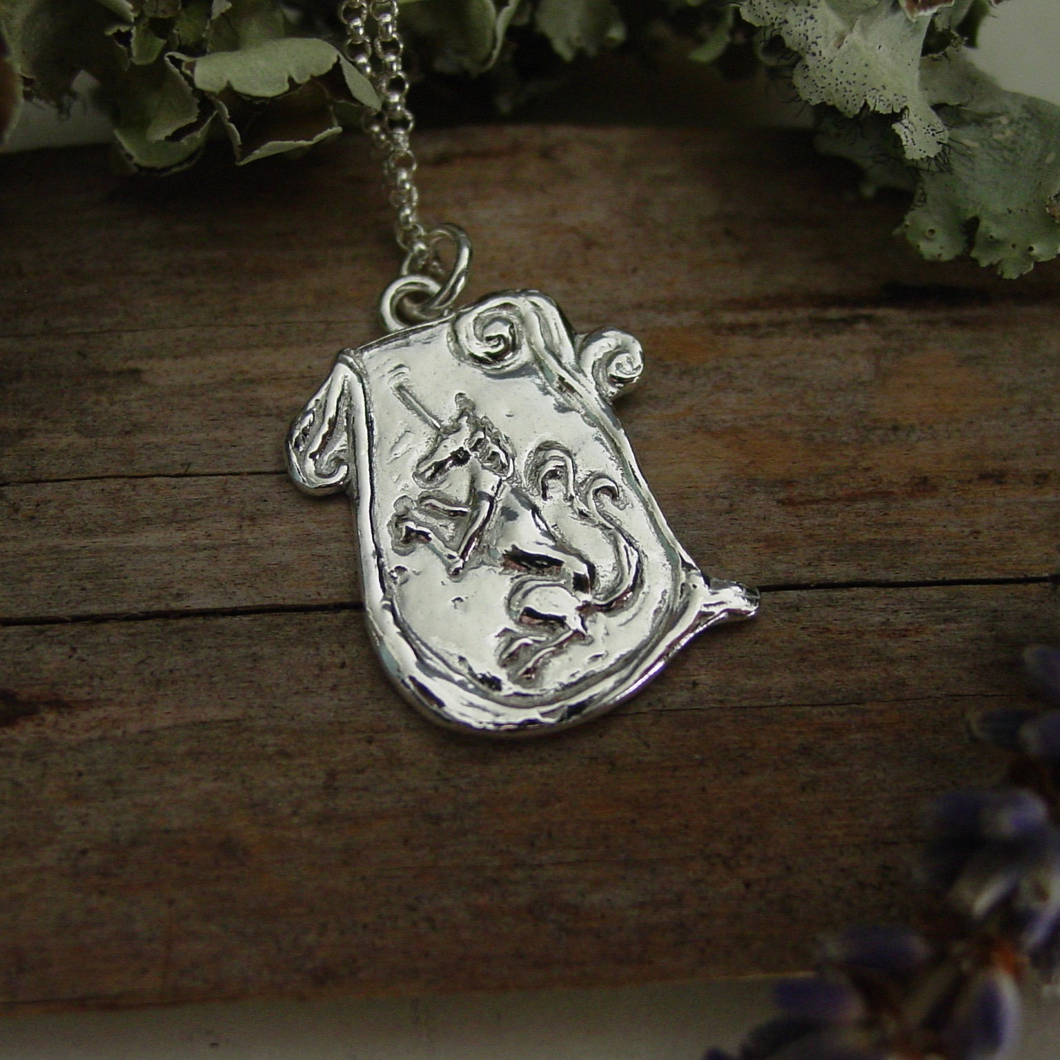 Silver Unicorn necklace close up