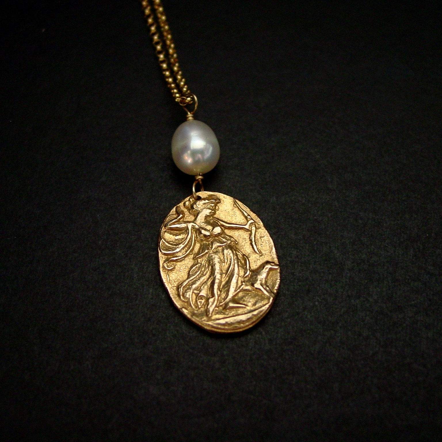 Artemis with pearl necklace