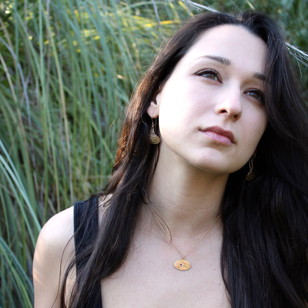 Eye of Horus earrings on model