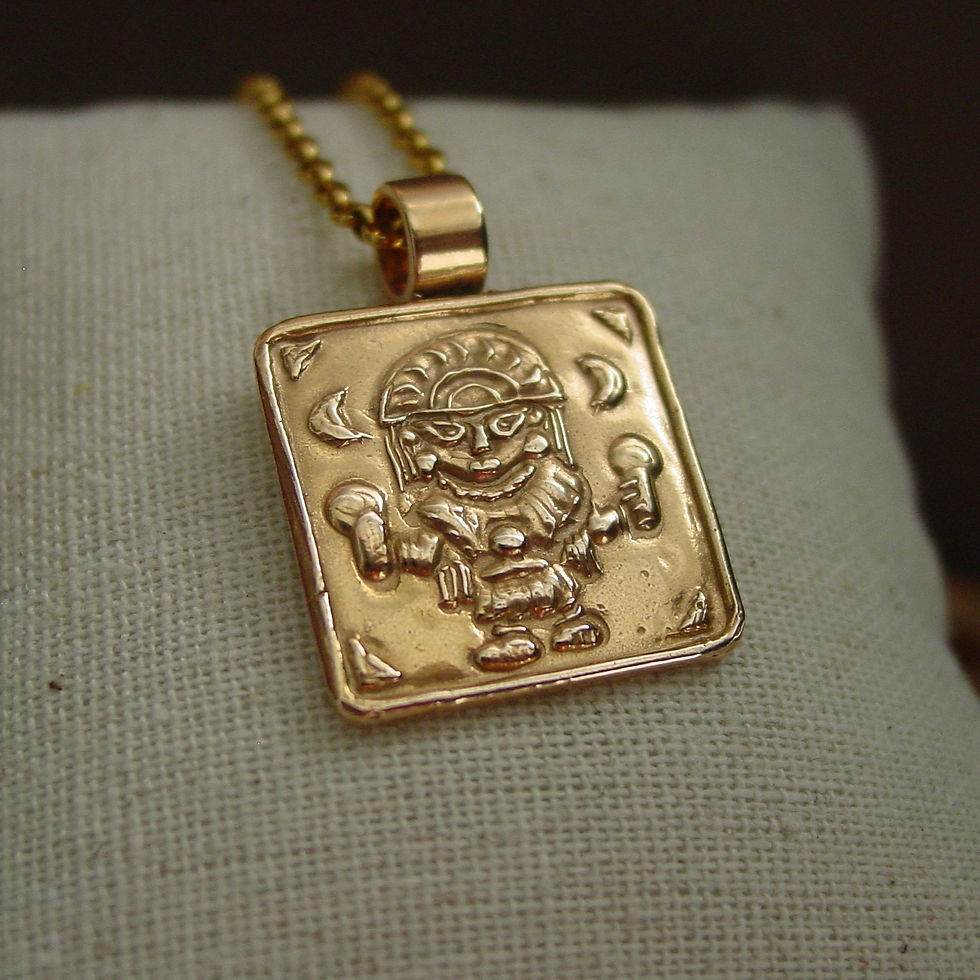 Thumbnail: Mama Quilla pendant on pillow