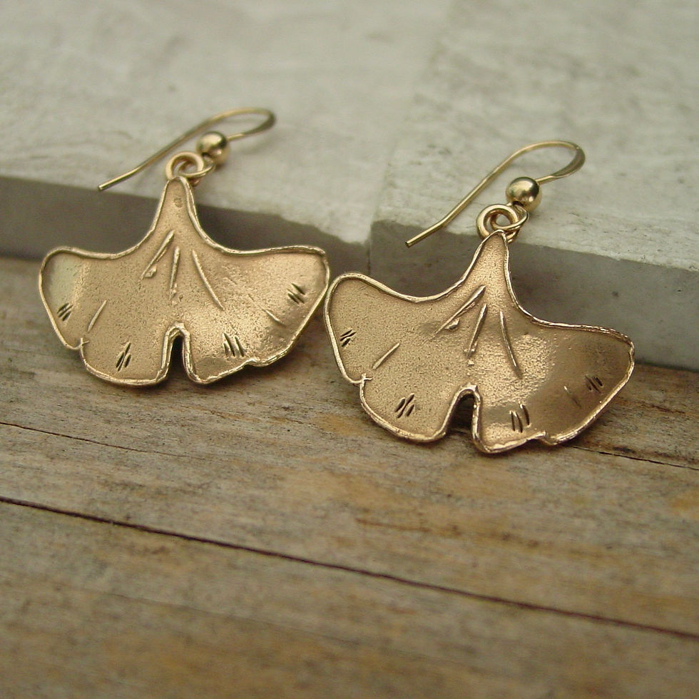 Thumbnail: Small Ginkgo leaf earrings on limestone