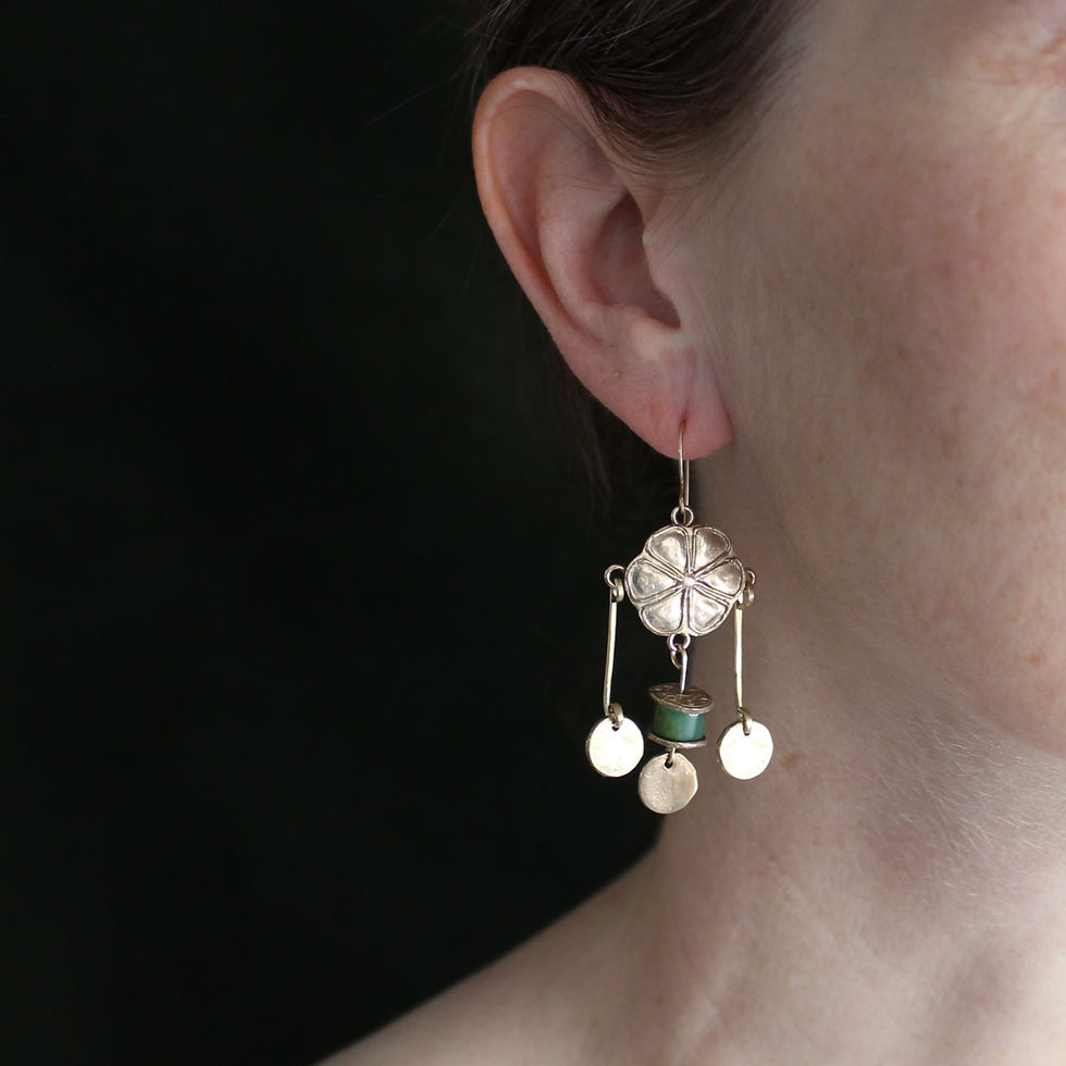 Roman earrings on woman