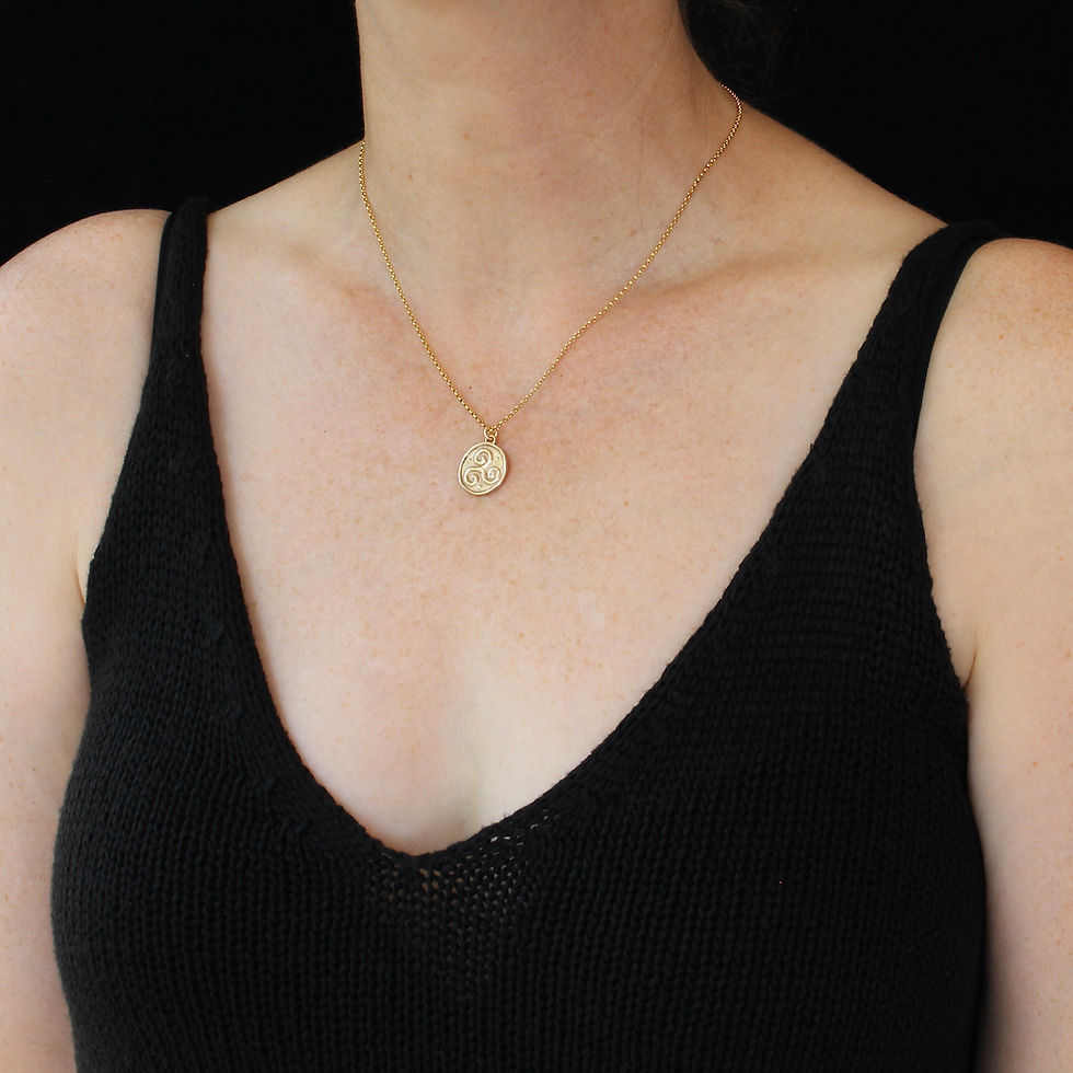 Triskel necklace on woman