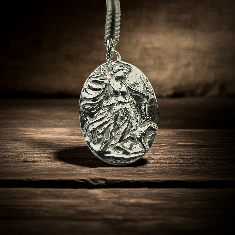 Silver Artemis necklace on table