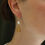 Thumbnail: Hathor Egyptian goddess of love and beauty earrings on model
