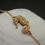 Thumbnail: Seahorse bracelet on shell