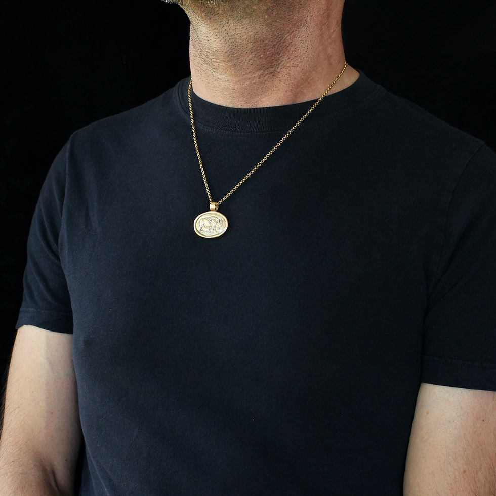 Bison pendant on man