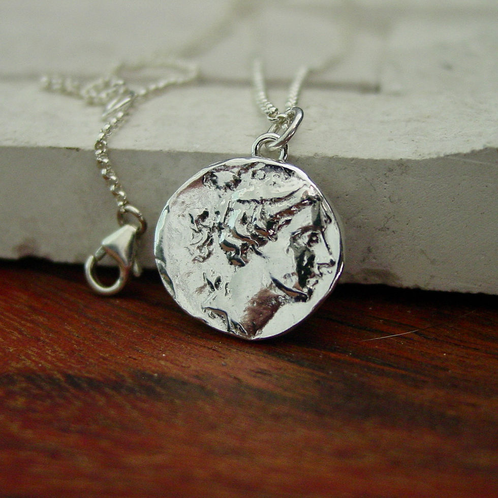 Silver Diana Artemis coin necklace close up