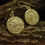 Thumbnail: Iceni wolf earrings on wood