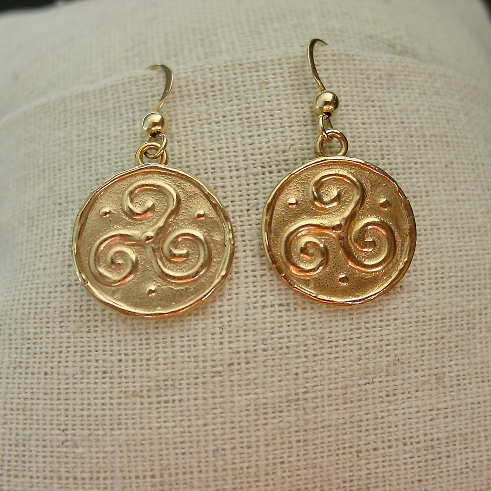 Thumbnail: Triskel earrings on pillow