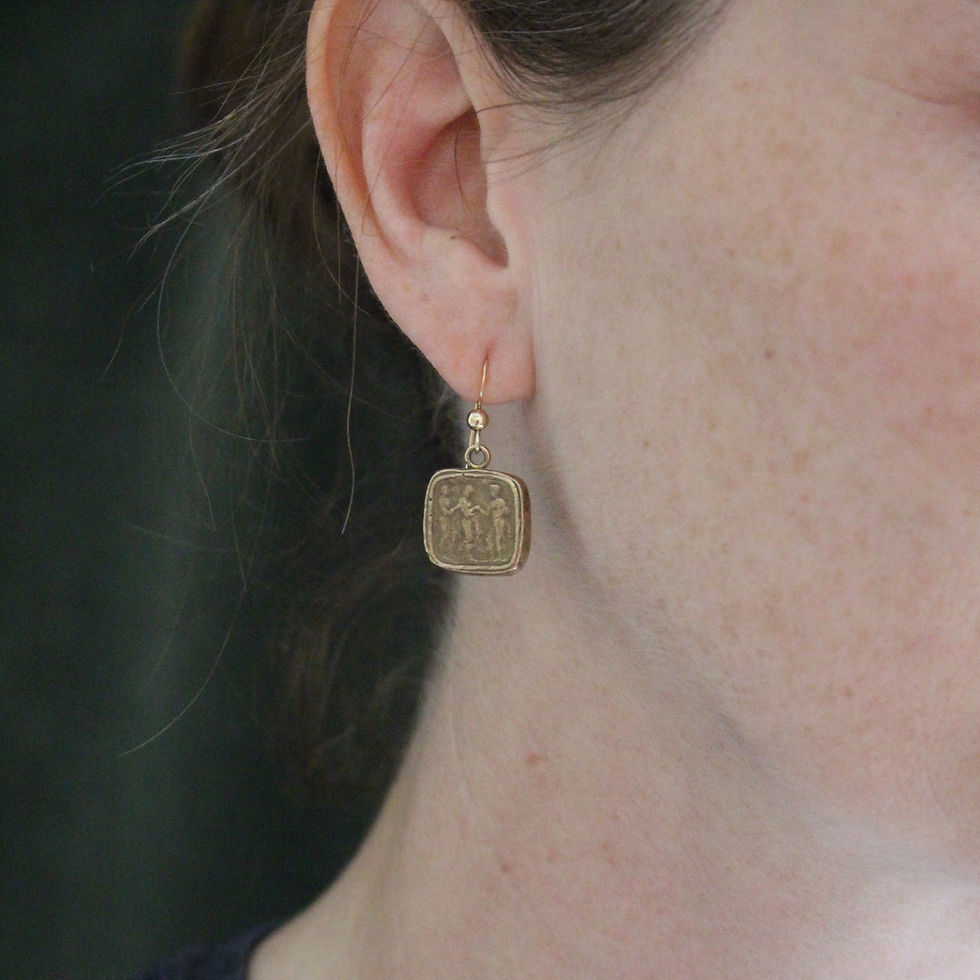 Penelope square earrings on model
