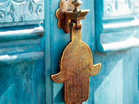 What does the Hamsa hand symbol means? 