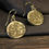 Thumbnail: Epona coin earrings on  table