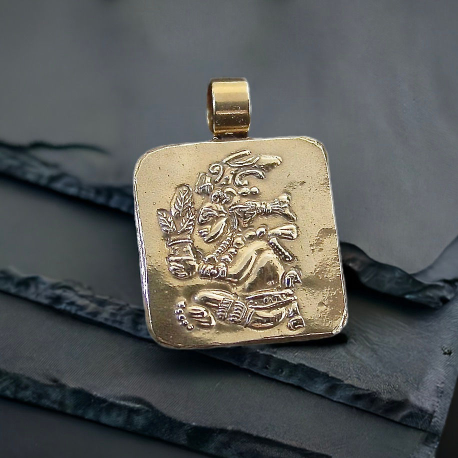 Yum Kaax Mayan Corn god pendant on slate