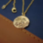 Thumbnail: Gold Celtic horse coin necklace side view