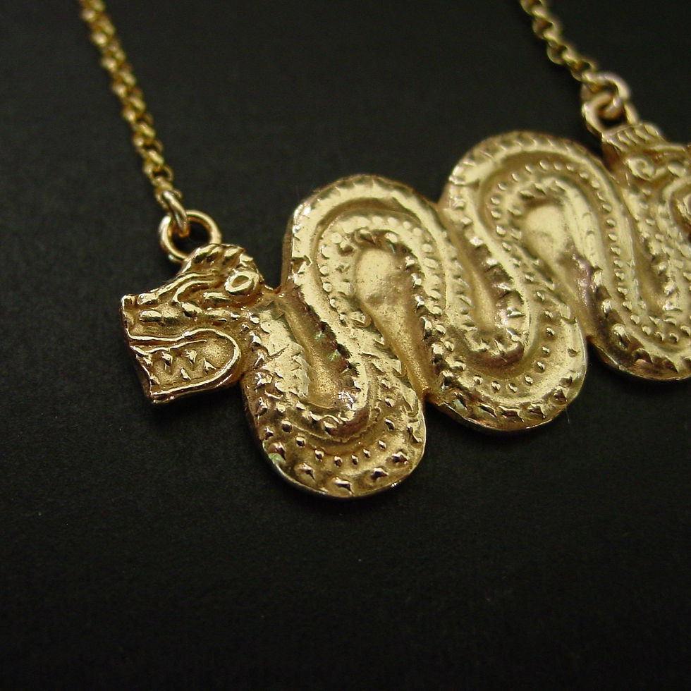 Thumbnail: Kukulkan serpent necklace close up