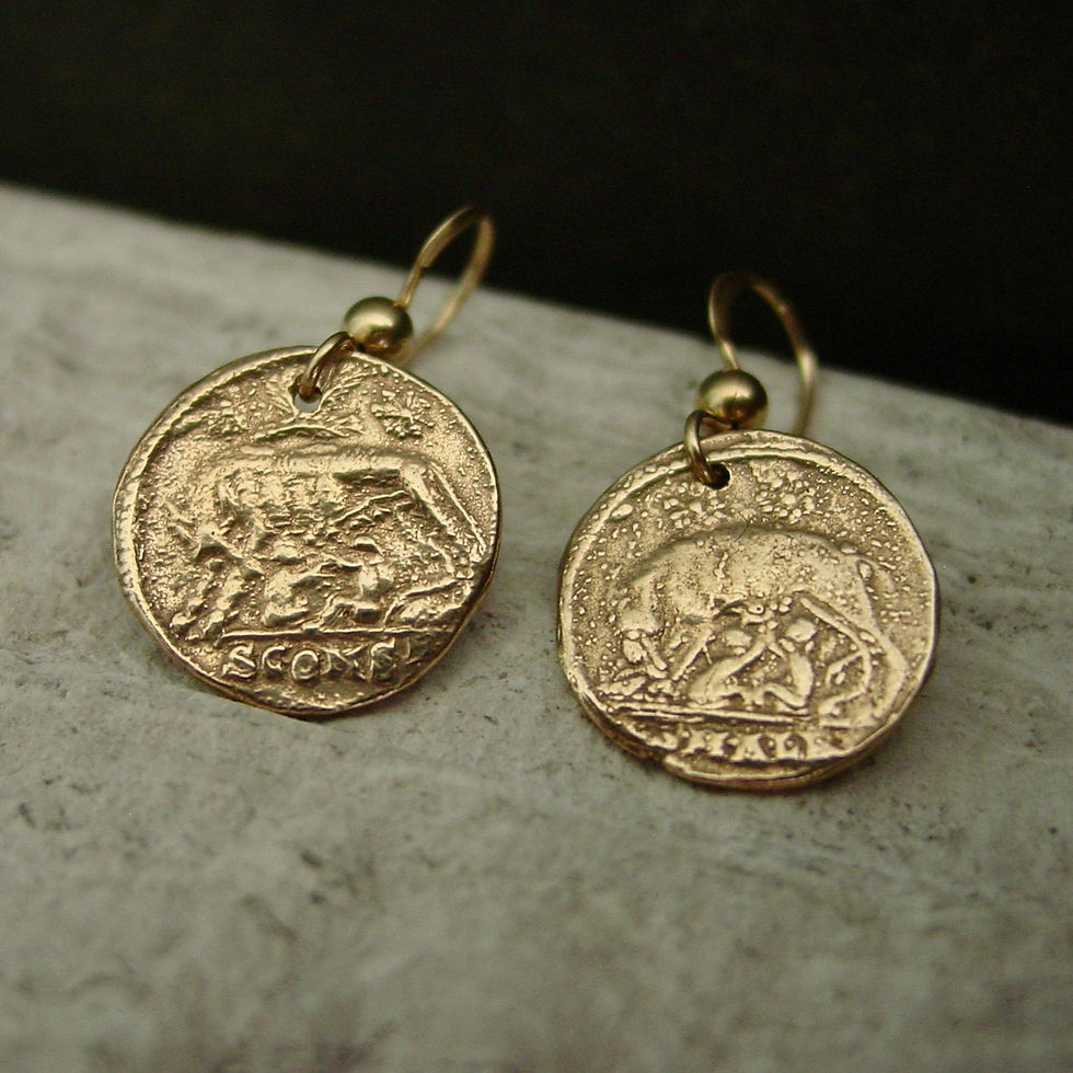 Remus and Romulus Coin earrings on limestone