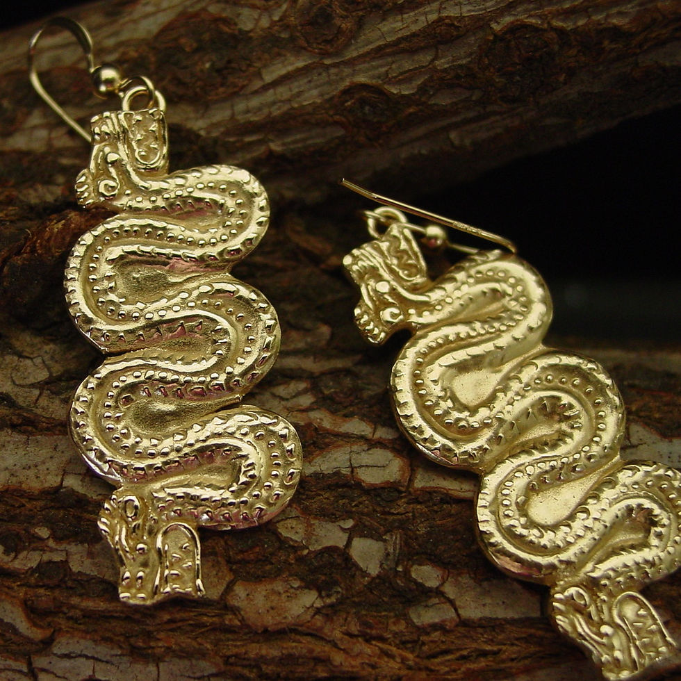 Thumbnail: Mayan Plumed Serpent earrings on branch