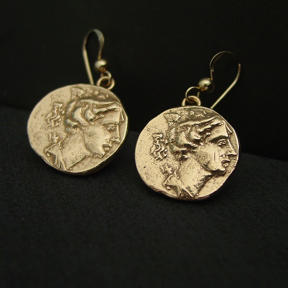 Artemis coin earrings on slate