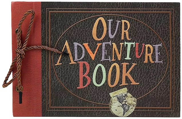 Brown and red scrapbook with "Our Adventure Book" written in colorful letters on the cover. Bound with a string. Globe design below text.