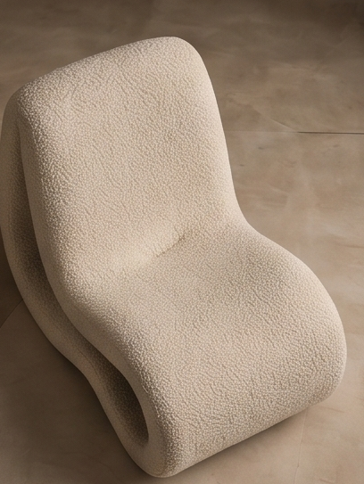 Cream boucle armchair from Dolce Riposo