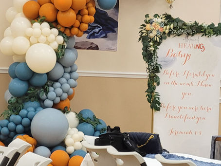 Blue and orange balloon garland arch decor for a celebration in Central Florida