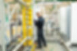 Contactless Check Solution fire data pin being installed to a timber fire doorset at the point of manufacture