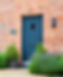A cottage door style finished in dark grey