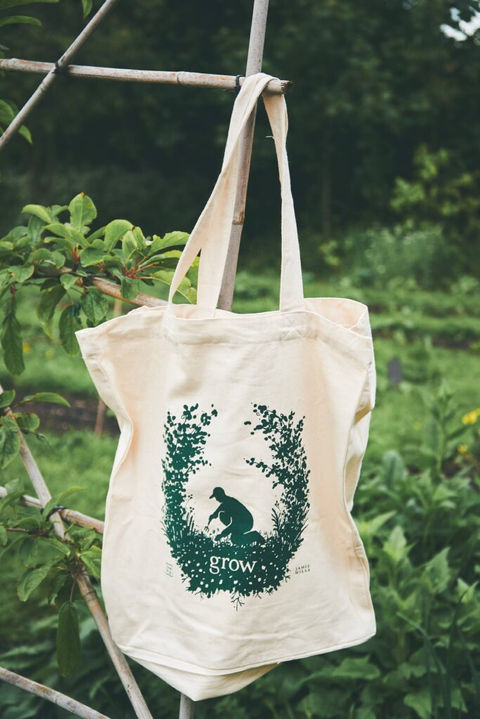 Illustrated tote bag in a natural setting for the young people's charity Grow. The tote bag is illustrated with an image of a person gardening, surrounded by plants