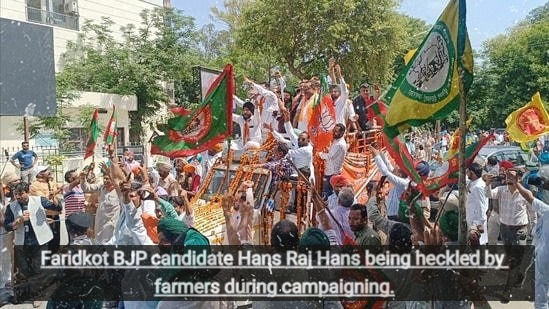 Faridkot BJP candidate Hans Raj Hans being heckled by farmers during campaigning.