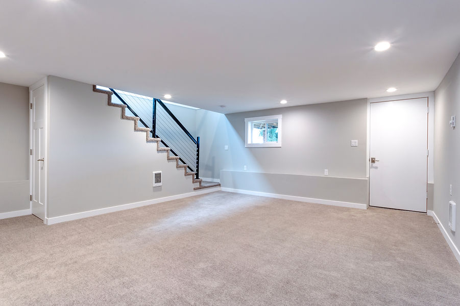 empty room with white colour scheme with attached staircase
