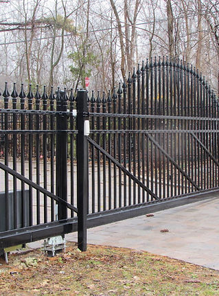 A closeup photo of wrought iron fencing