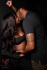 An intimate moment captured by Michael Anthony at My Canvas Portraits, showing a couple in a close dance-like embrace, with their faces nearly touching, highlighting the shared affection and connection