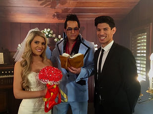 Jesse Garon as Elvis marrying couple at chapel in las vegas