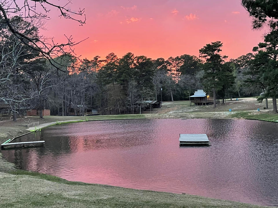 swimming lake at sunset