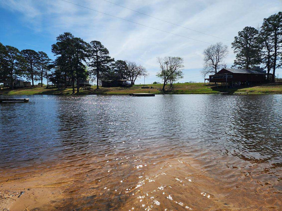 Summer image of the swimming lake at Salmon Lake Park.